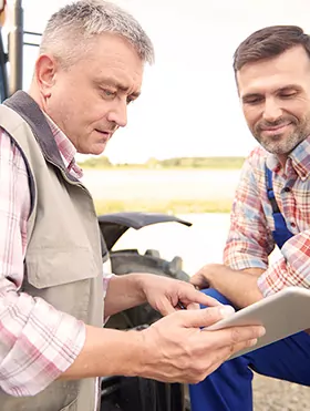 two farmers communicating