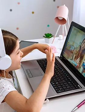 girl studying on laptop