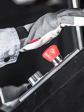 man pressing an emergency button