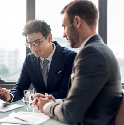 few people conducting a meeting