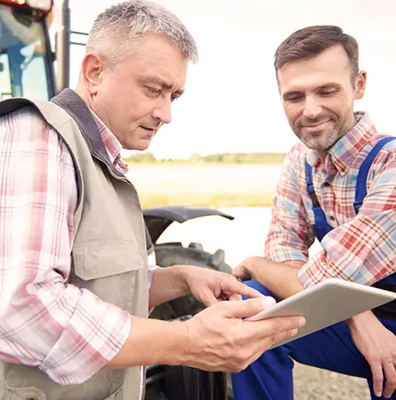 two farmers communicating