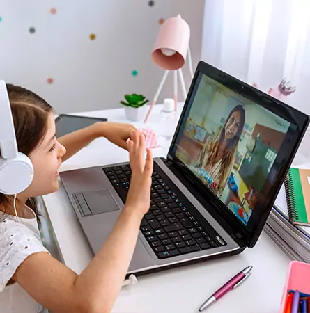 girl studying on laptop